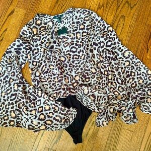 Forever 21 Animal Print Top w/back bodysuit attached below.Never Worn NWT